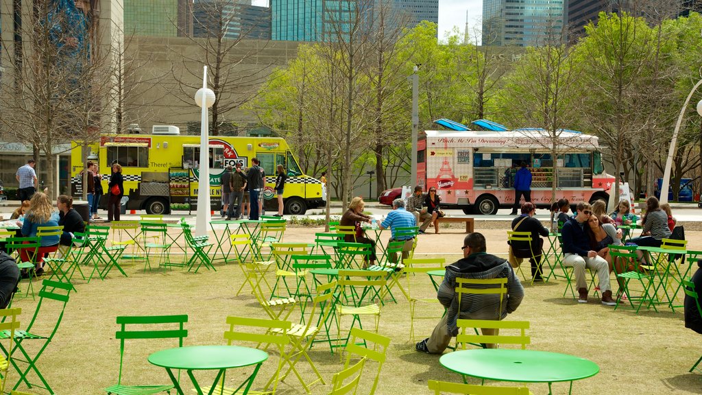 Klyde Warren Park which includes a park, a city and outdoor eating