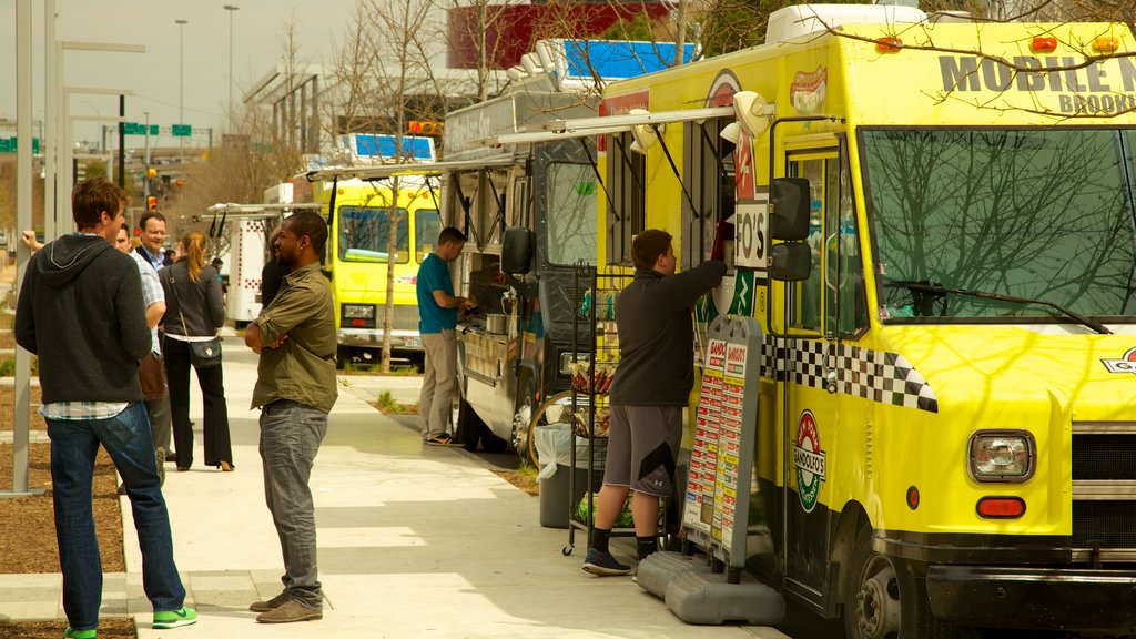 Klyde Warren Park which includes signage and street scenes