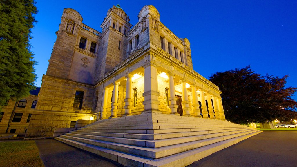 British Columbia Parliament Building which includes night scenes, heritage architecture and an administrative building