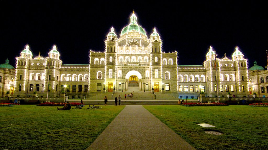 British Columbia Parliament Building showing night scenes, heritage architecture and an administrative building