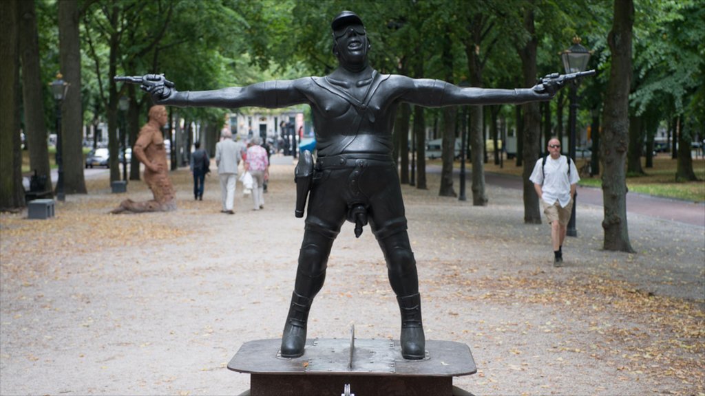 Lange Voorhout que incluye una estatua o escultura