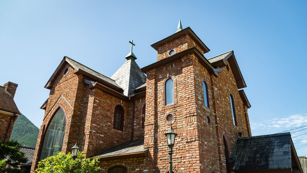 Yufuin Stained Glass Museum which includes heritage architecture and a church or cathedral