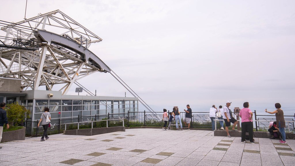 Hakodate Ropeway showing views and a gondola as well as a small group of people