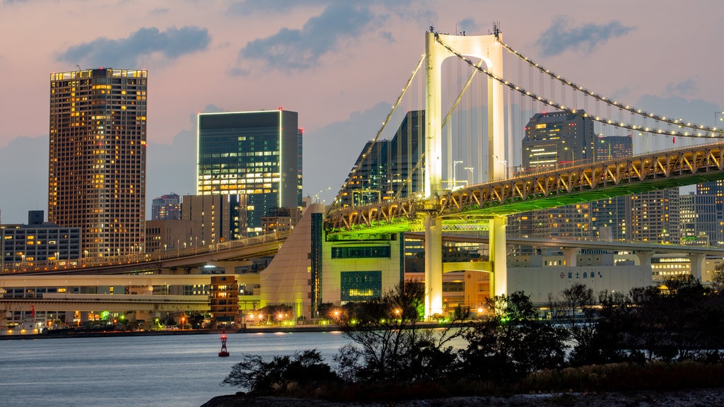 Ponte do Arco-íris mostrando um pôr do sol, paisagem e uma ponte