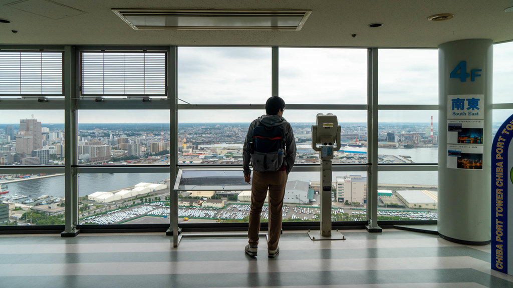 Chiba Port Tower which includes interior views and views as well as an individual male