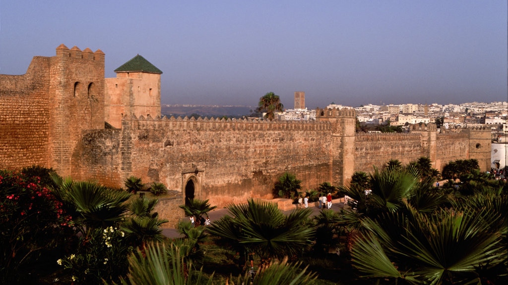 San Juan de Dios featuring heritage architecture, landscape views and a sunset