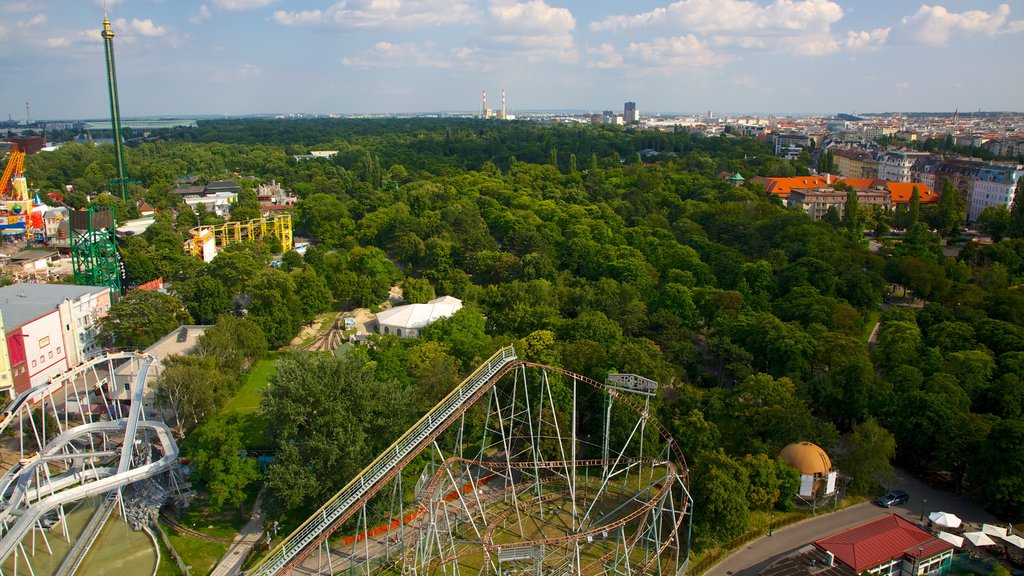 Wiener Prater which includes forest scenes, rides and a city