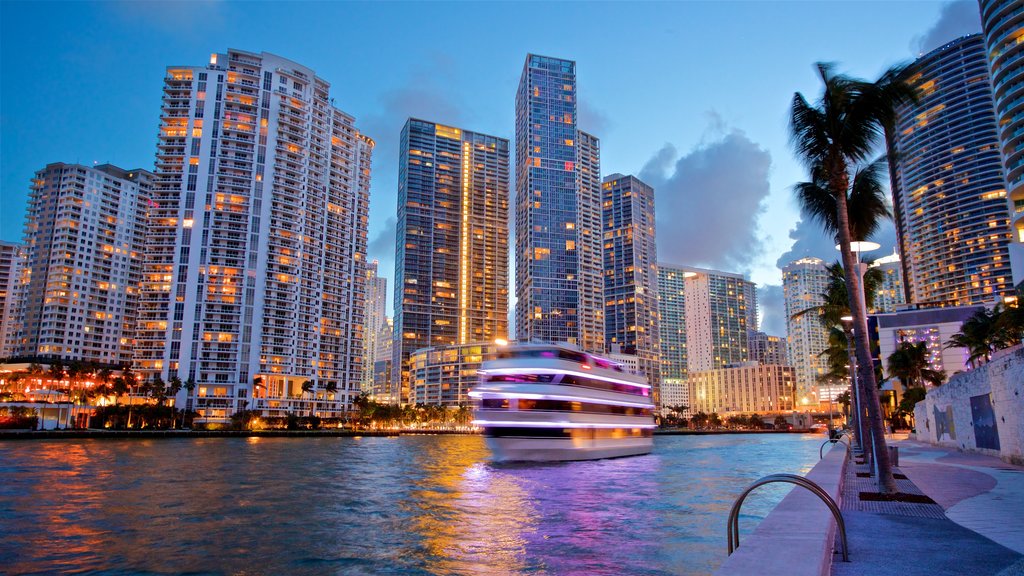 Miami which includes a bay or harbour, a city and night scenes