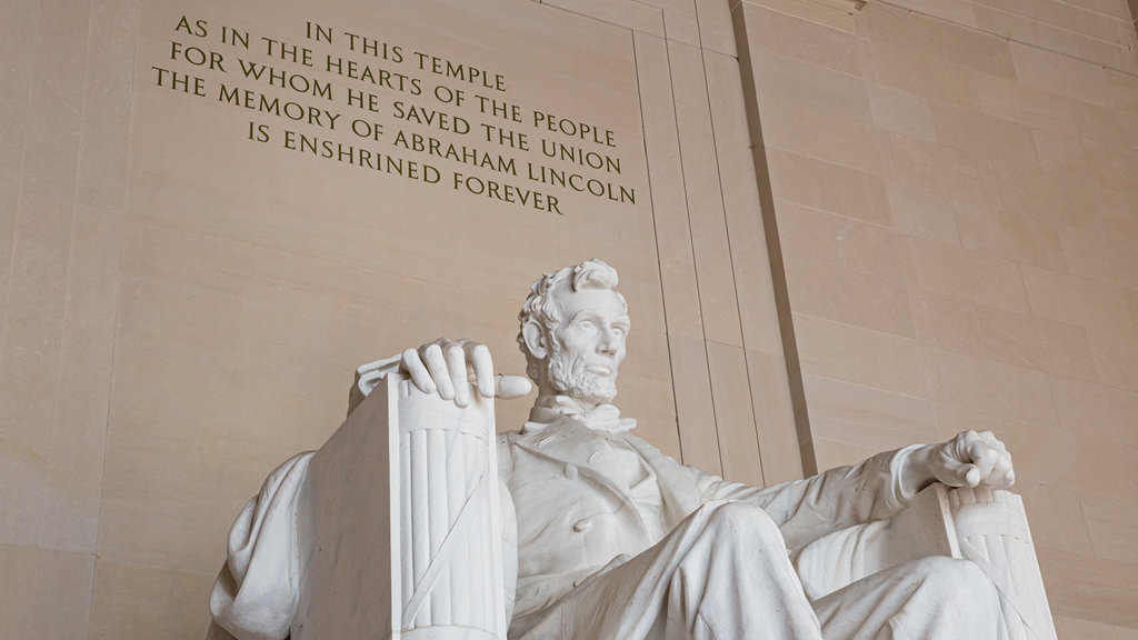 Lincoln Memorial which includes interior views, signage and a monument