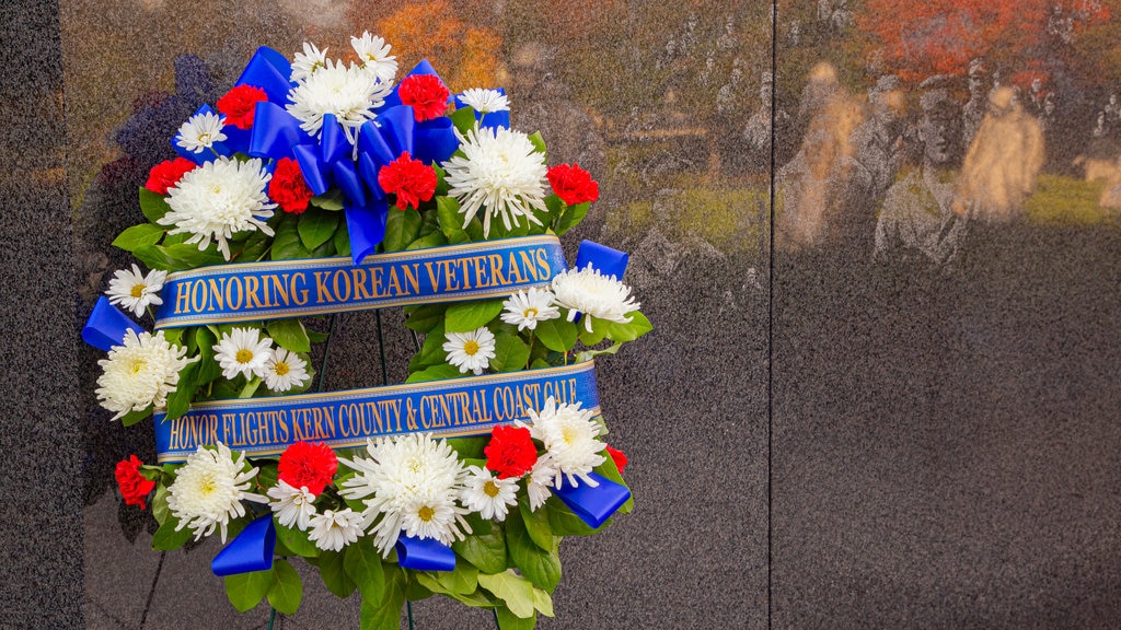 Korean War Veterans Memorial showing flowers and signage