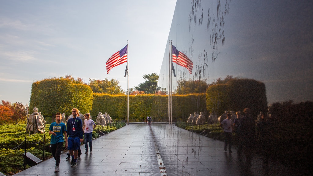 Korean War Veterans Memorial showing a park as well as a small group of people