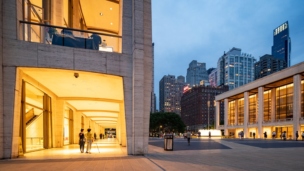 Lincoln Center which includes a square or plaza, a city and night scenes