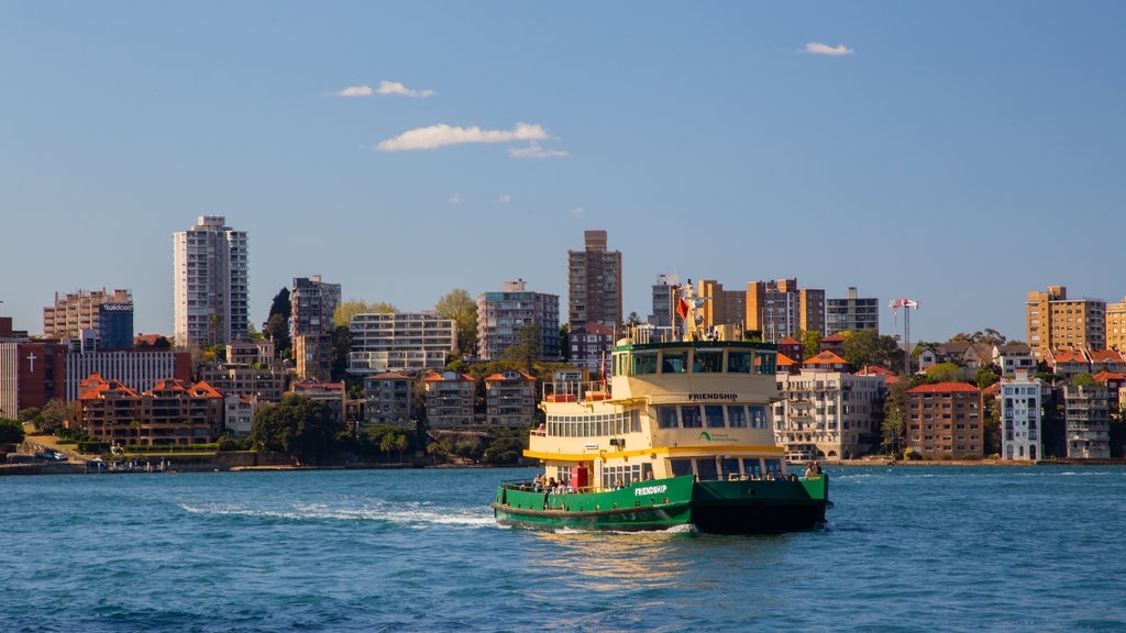 Circular Quay which includes a bay or harbour, boating and a city