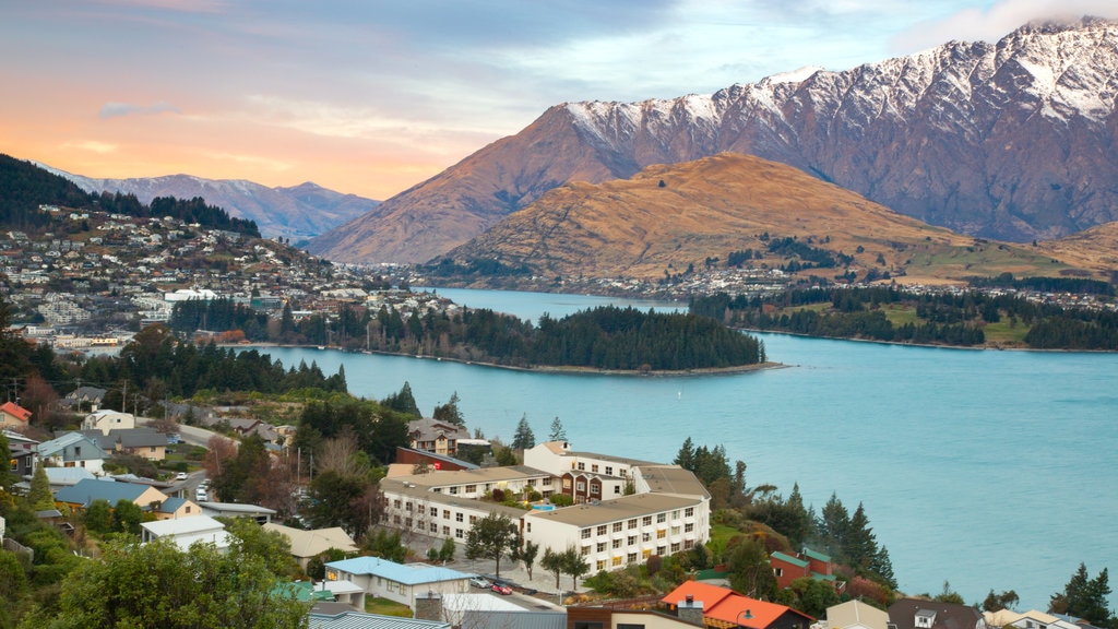 South Island which includes a sunset, mountains and a small town or village