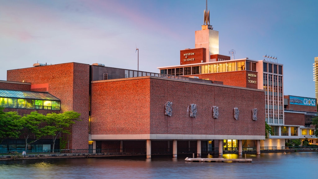 Museum of Science which includes a bay or harbour and a sunset