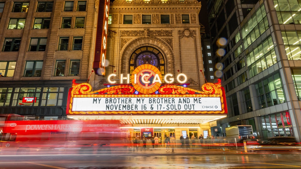 Chicago Theatre featuring street scenes, a city and signage