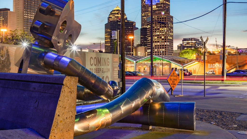 Deep Ellum featuring night scenes, a city and outdoor art