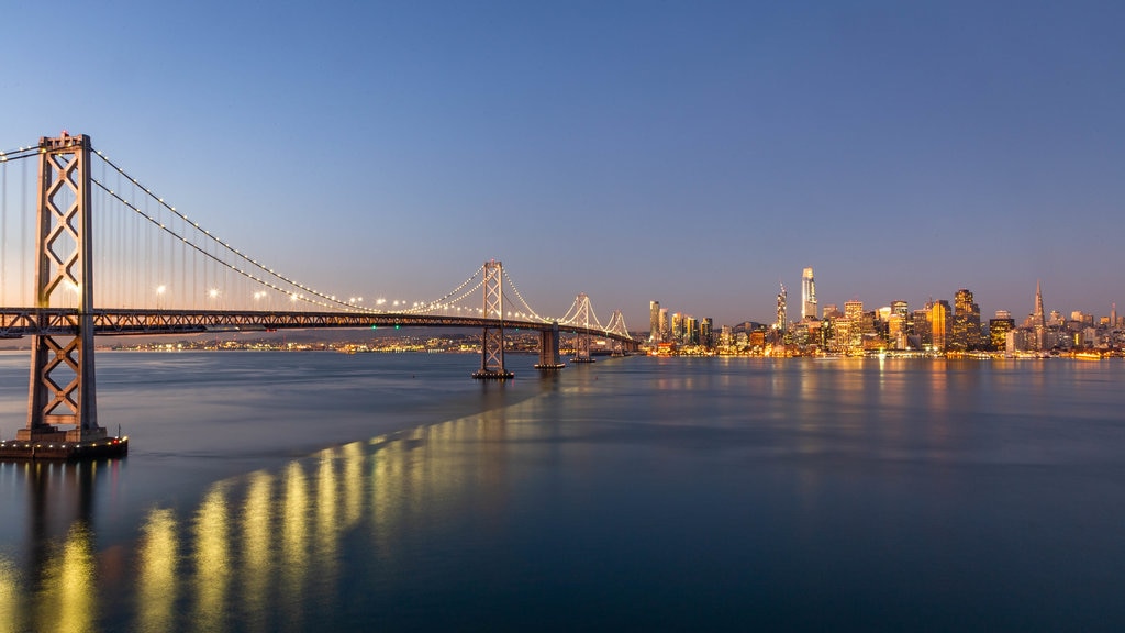 Bay Bridge showing night scenes, a city and a bay or harbour