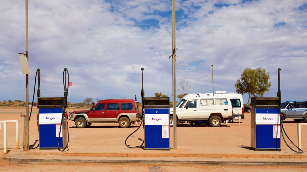 Red Centre featuring signage, farmland and off-road driving