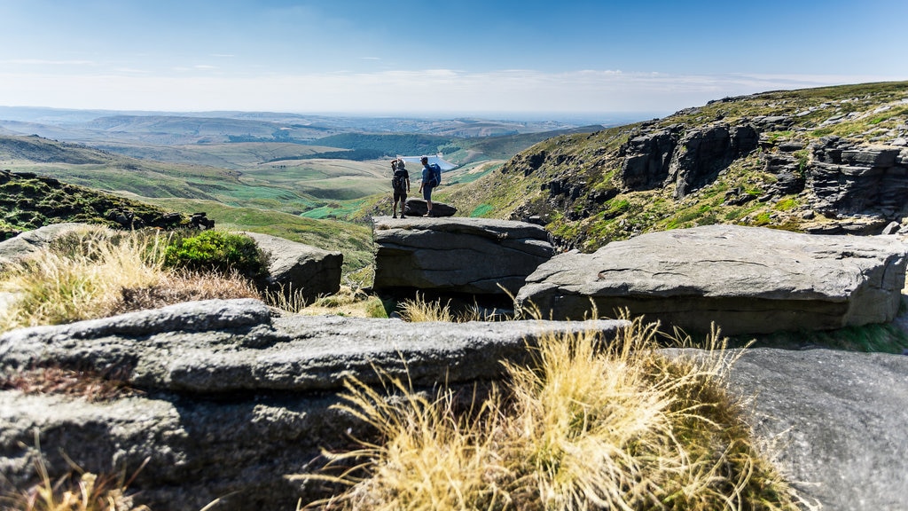 Peak District which includes hiking or walking and tranquil scenes as well as a couple