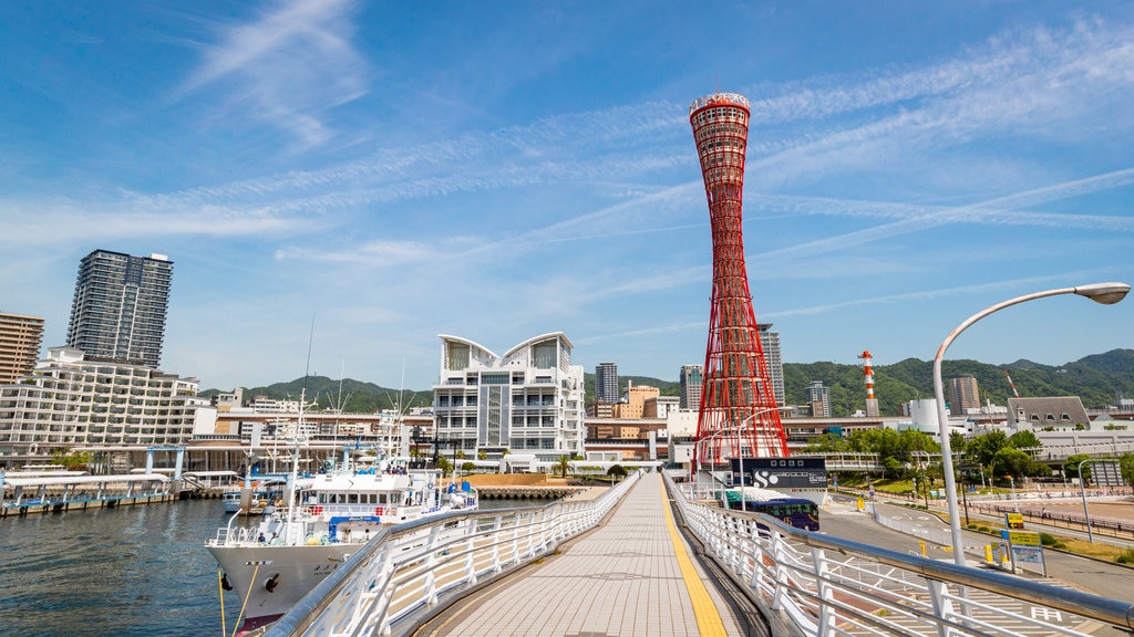 Kobe Tower which includes modern architecture, a bay or harbour and a city