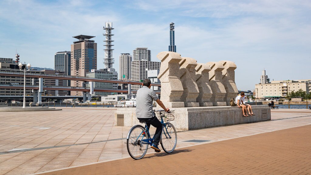 Parque Meriken mostrando ciclismo, escenas urbanas y un parque o plaza