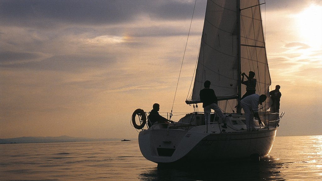 Bregenz featuring boating, a sunset and sailing