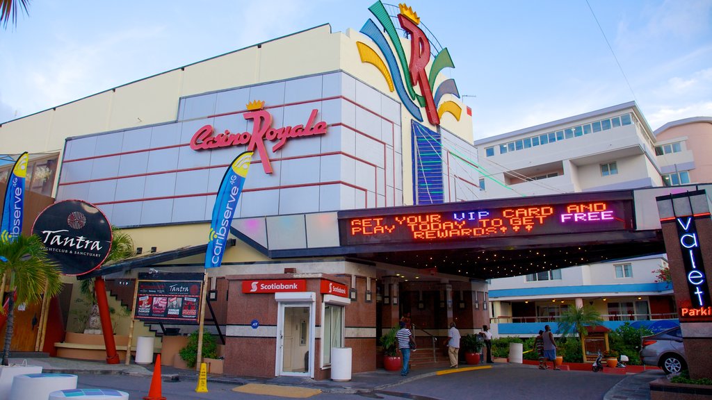 Casino Royale showing signage, a city and street scenes