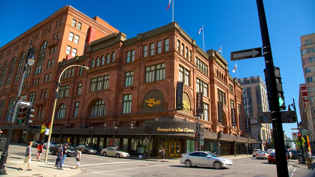 Downtown Montreal showing street scenes, heritage architecture and a city