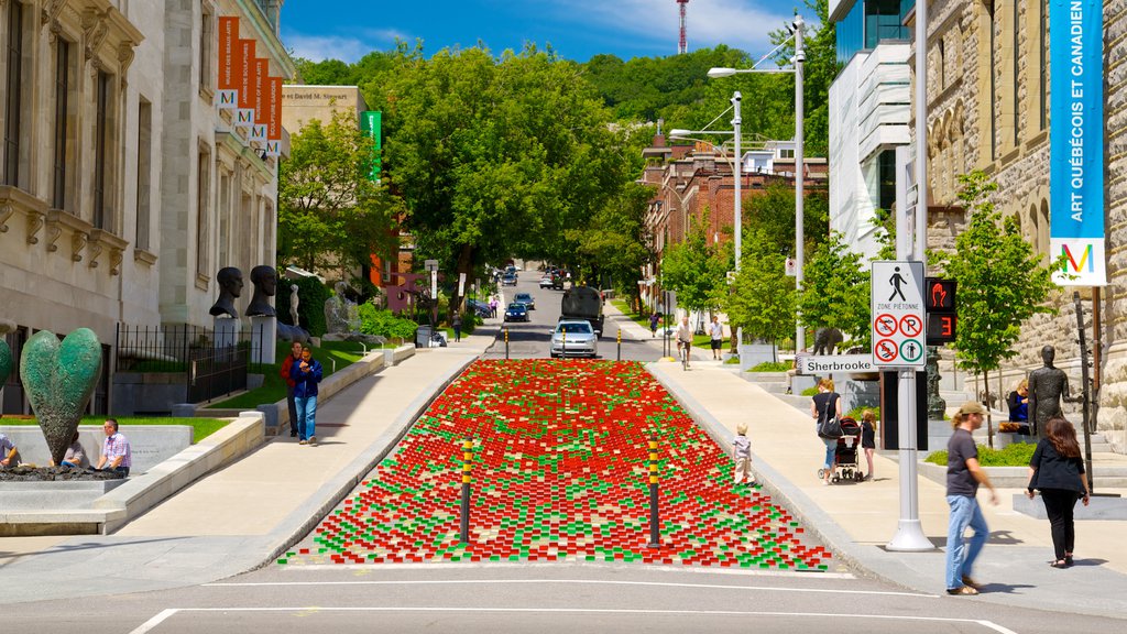 Montreal Museum of Fine Arts featuring street scenes, outdoor art and a city