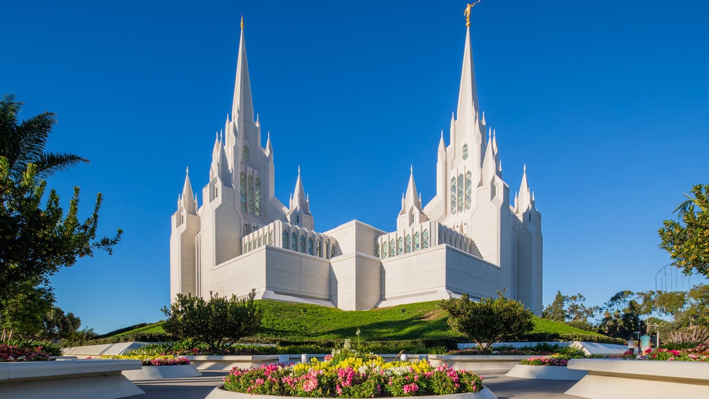 Southern California showing a church or cathedral, flowers and a garden