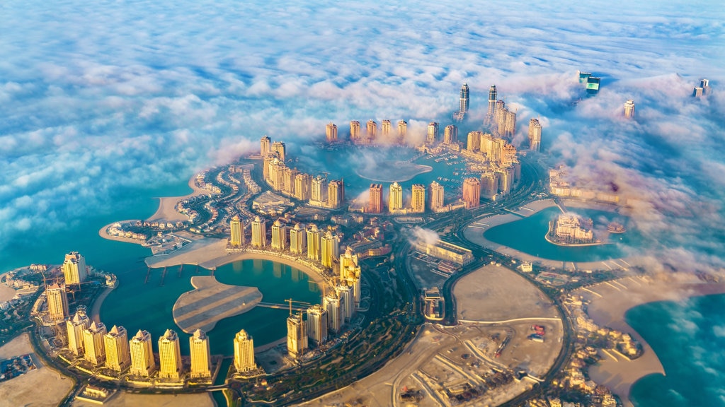 The Pearl-Qatar which includes a city, mist or fog and landscape views