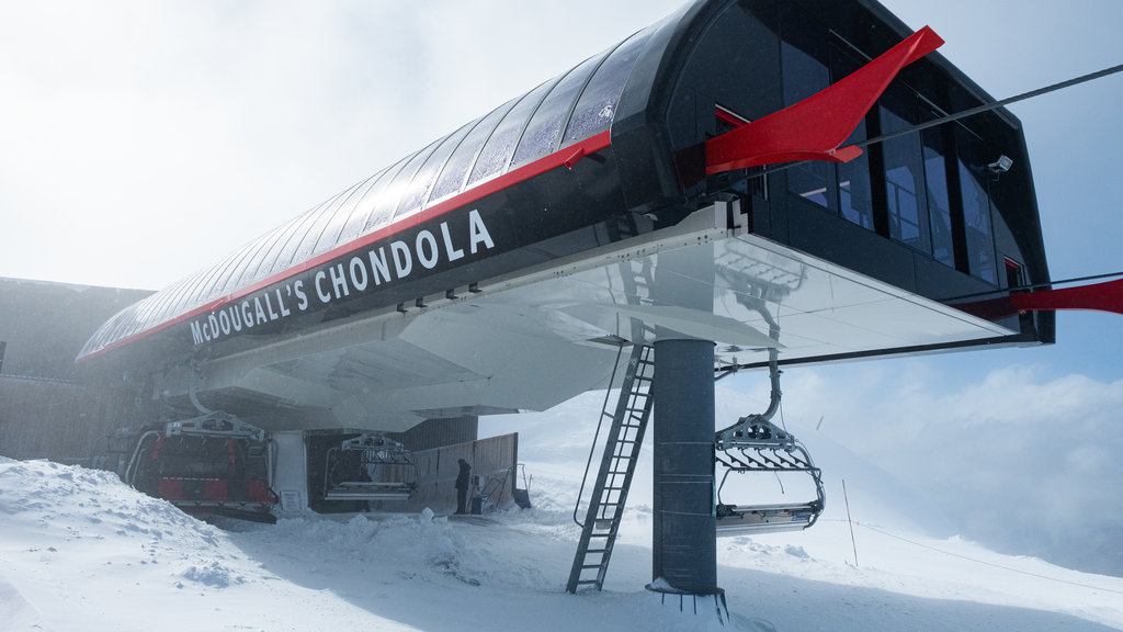 Cardrona Alpine Resort which includes snow, signage and a gondola