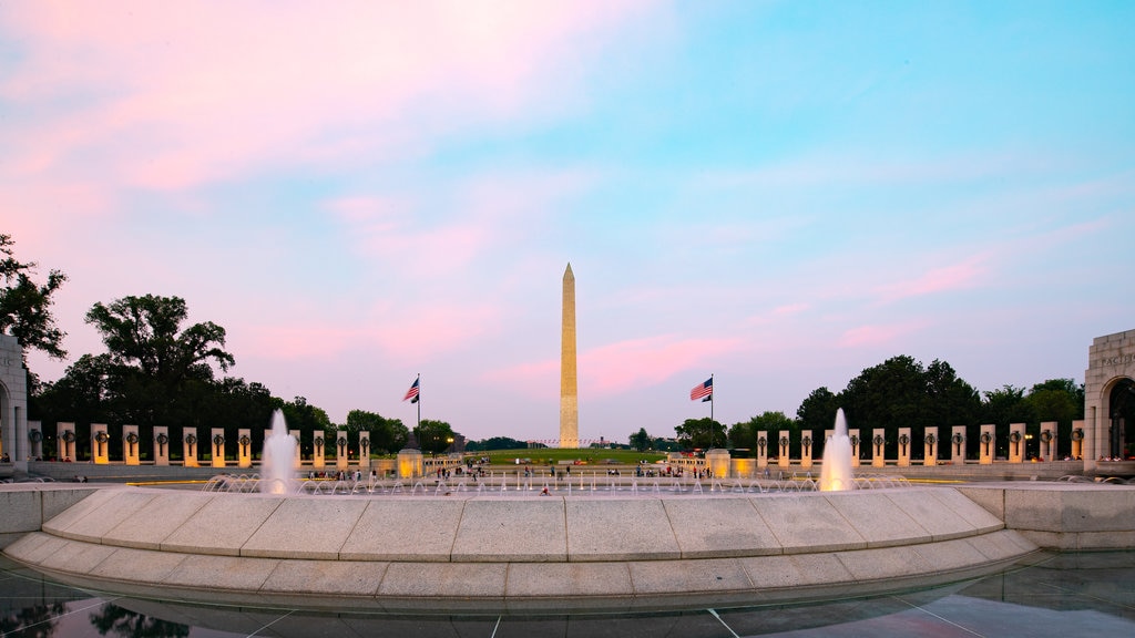 National World War II Memorial which includes a monument, a fountain and a sunset