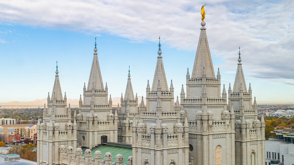 Salt Lake Temple which includes heritage architecture, landscape views and a sunset