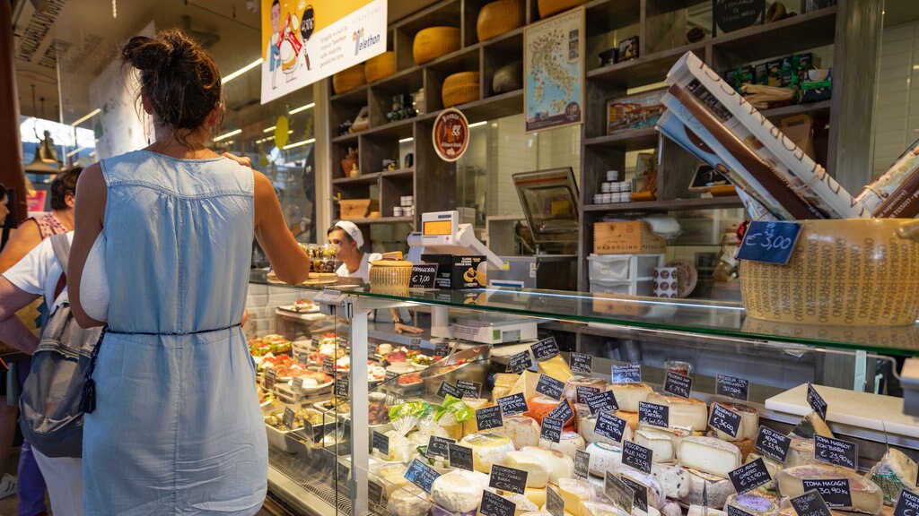 Central Market showing food as well as an individual femail