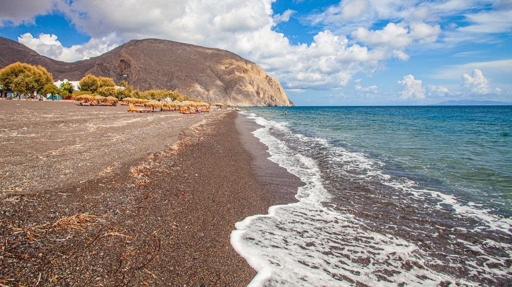 Santorini featuring rocky coastline and general coastal views