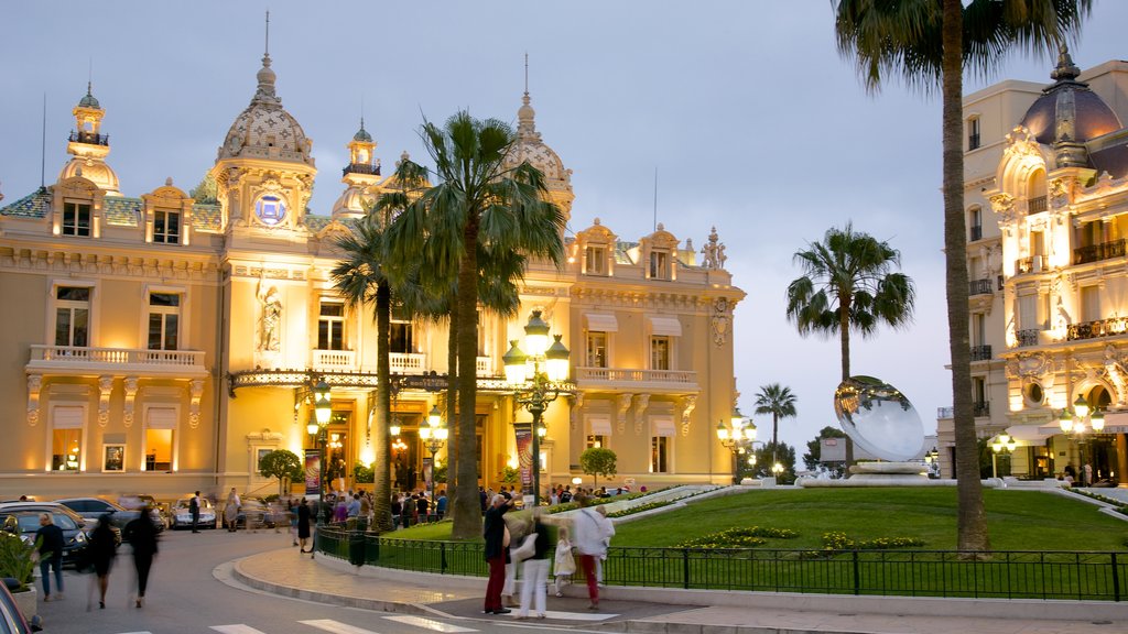 Casino Square which includes night scenes, heritage architecture and street scenes