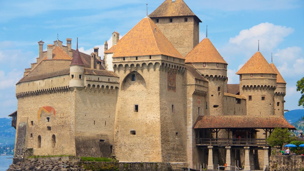 Chateau de Chillon featuring heritage architecture and a castle