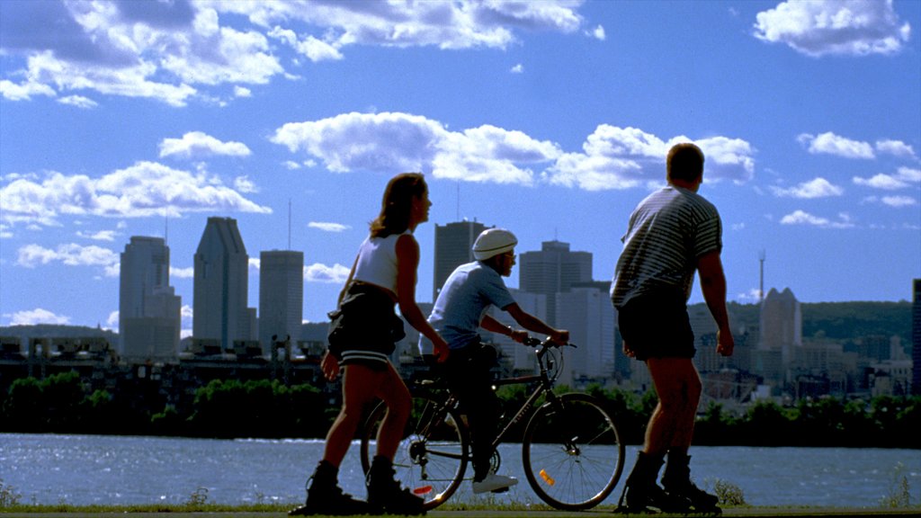 Parc Jean-Drapeau featuring cycling, a city and a river or creek