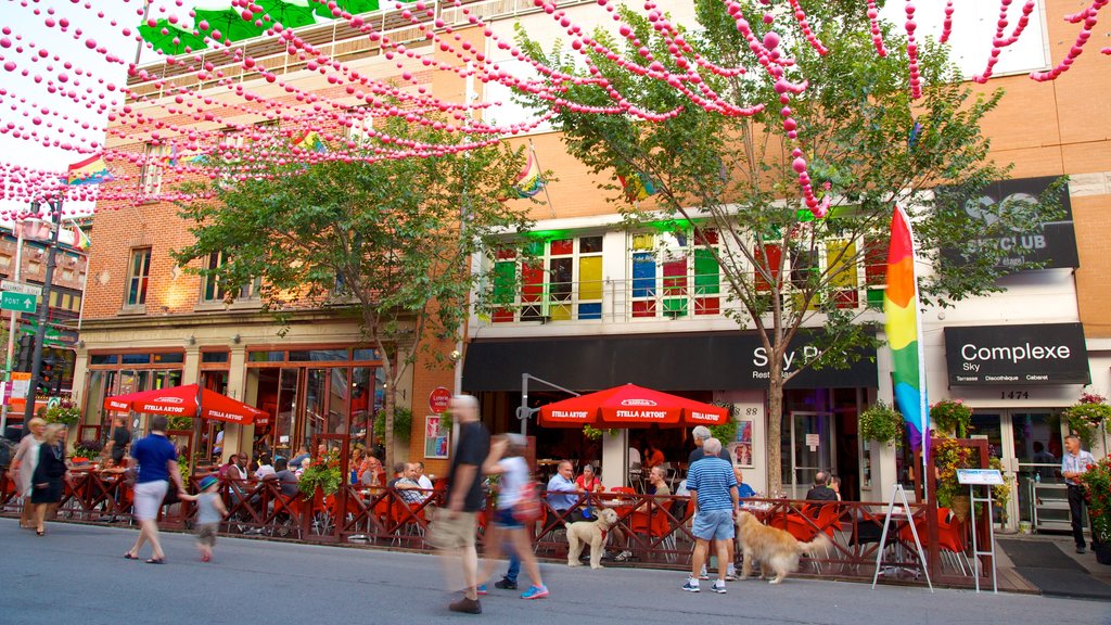 Gay Village mostrando jantar ao ar livre, sinalização e cenas de rua