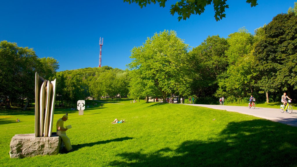 Mount Royal Park showing outdoor art, forests and a statue or sculpture