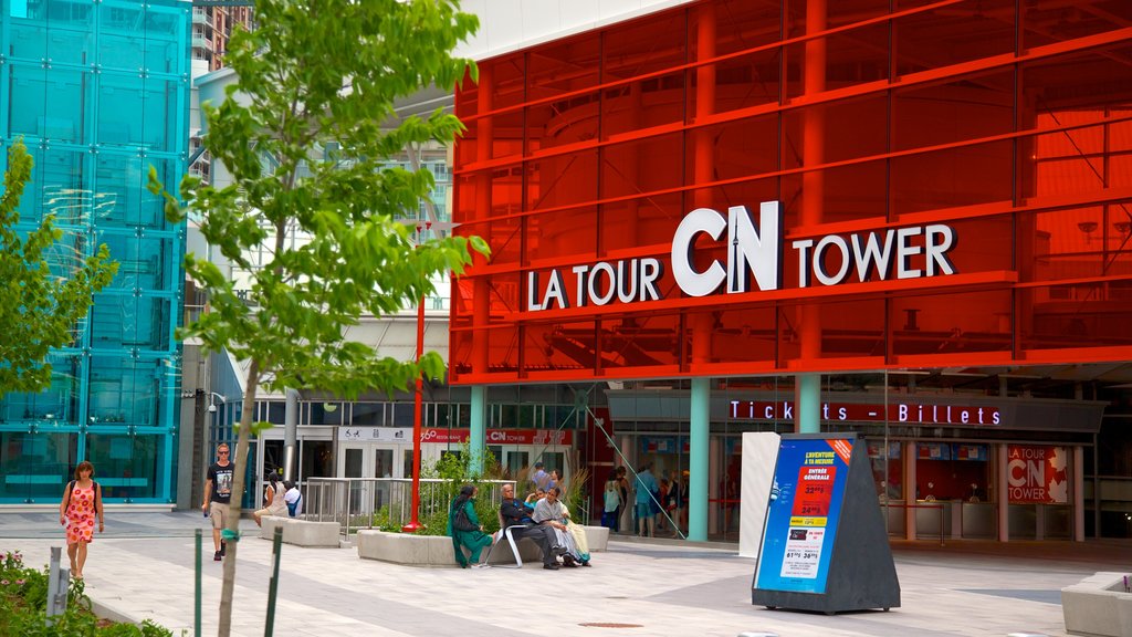 CN Tower showing signage, city views and modern architecture