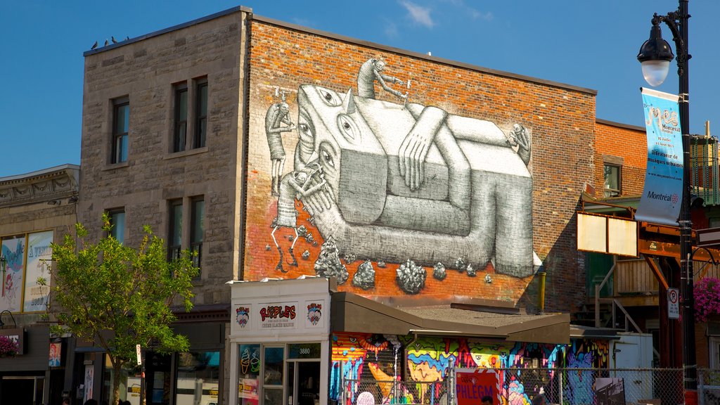 Plateau Mont Royal que incluye arte al aire libre y una ciudad