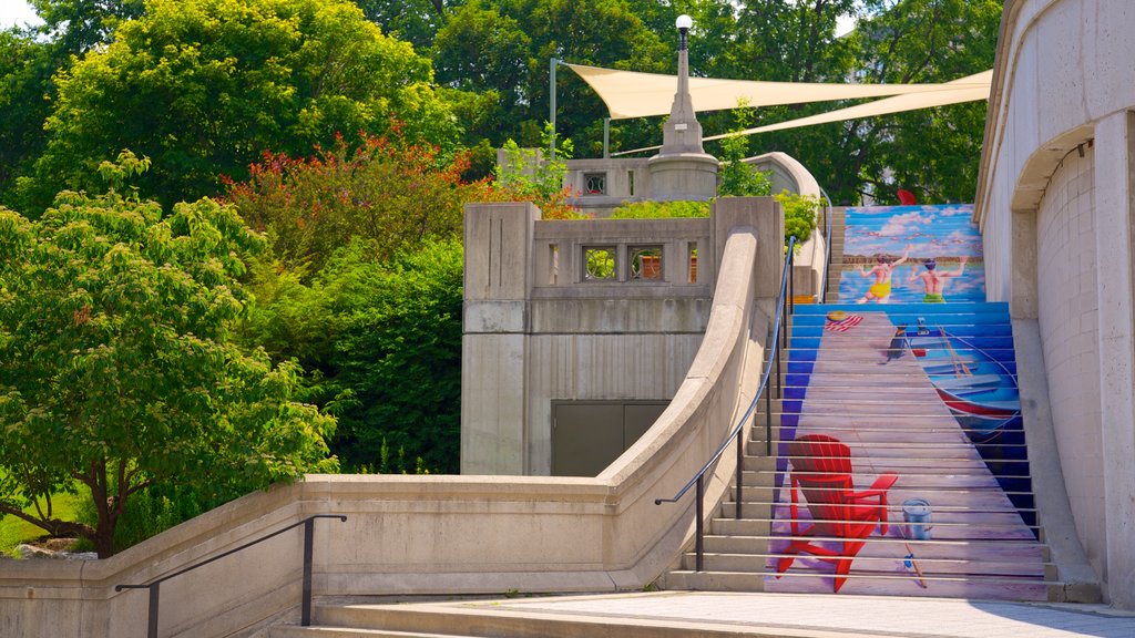 Rideau Canal featuring heritage architecture and outdoor art