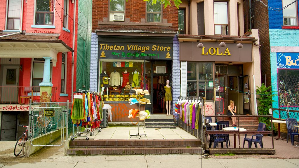 Kensington Market mostrando distrito comercial central, uma cidade e sinalização