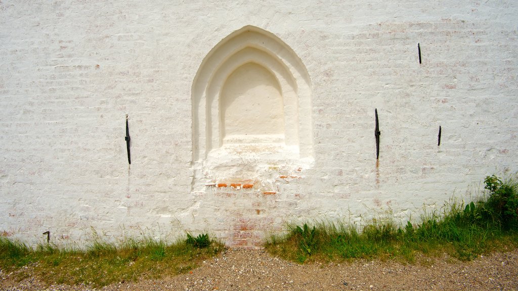 Den Tilsandede Kirke showing a church or cathedral