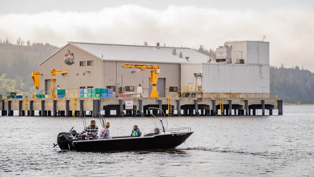 Neah Bay showing a bay or harbour and boating as well as a small group of people