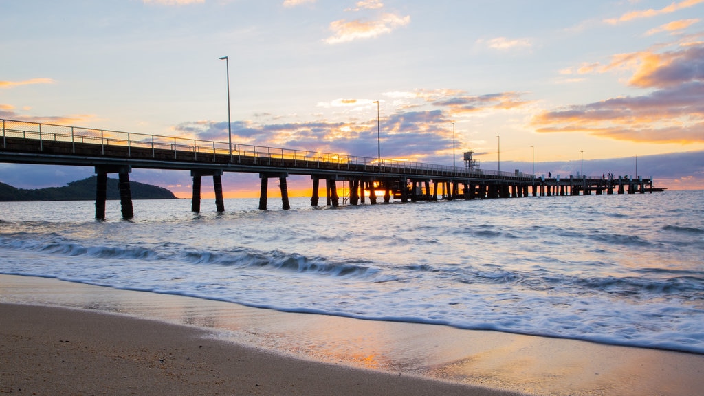 Palm Cove Beach which includes general coastal views and a sunset