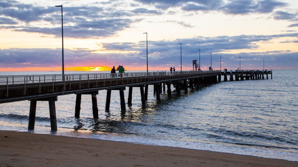 Palm Cove Beach featuring general coastal views and a sunset